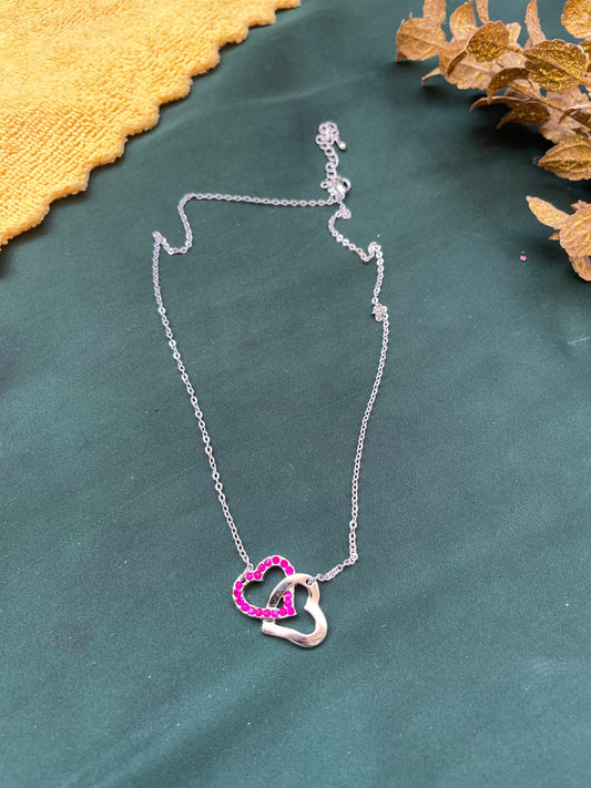 Pink double heart pendant with silver plated chain