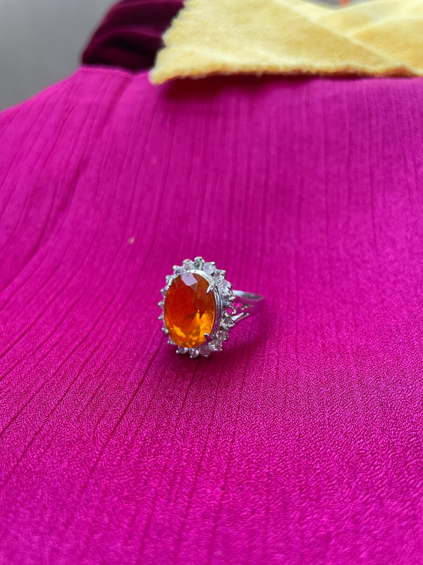 Oval sunset citrine stone cocktail design silver ring